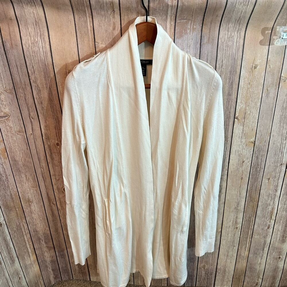 White House Black Market  long cream colored sweater, with front pockets Women M